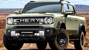 Picape Chery Stockman verde-clara em uma estrada de terra, vista de frente e de lado.