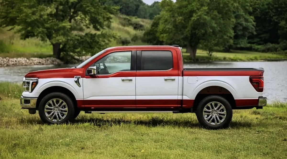 Ford F-150 com carroceria branca e detalhes vermelhos, vista de lado, junto a um lago.