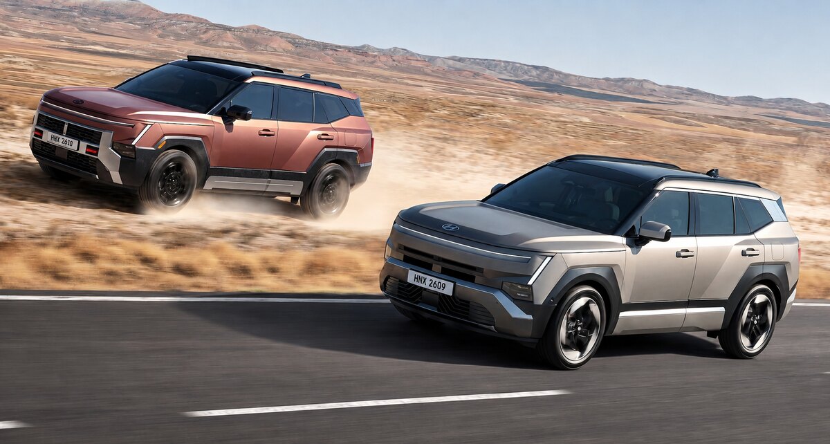Dois SUVs Hyundai em movimento, um cinza e outro cobre, em uma estrada cercada por terreno árido.